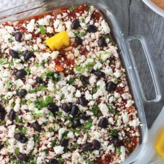 Spicy layered dip with beans an cheese