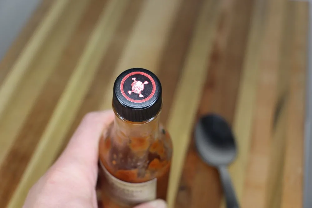 Wild elephant deterrent hot sauce cap