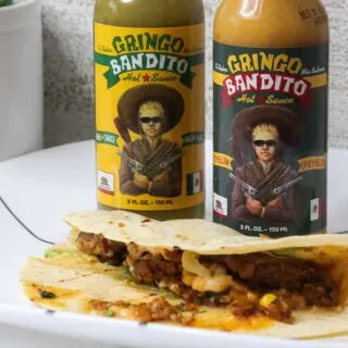 Gringo Bandito hot sauces and taco on plate