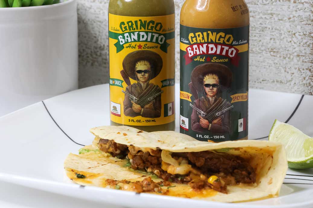 Gringo Bandito hot sauces and taco on plate