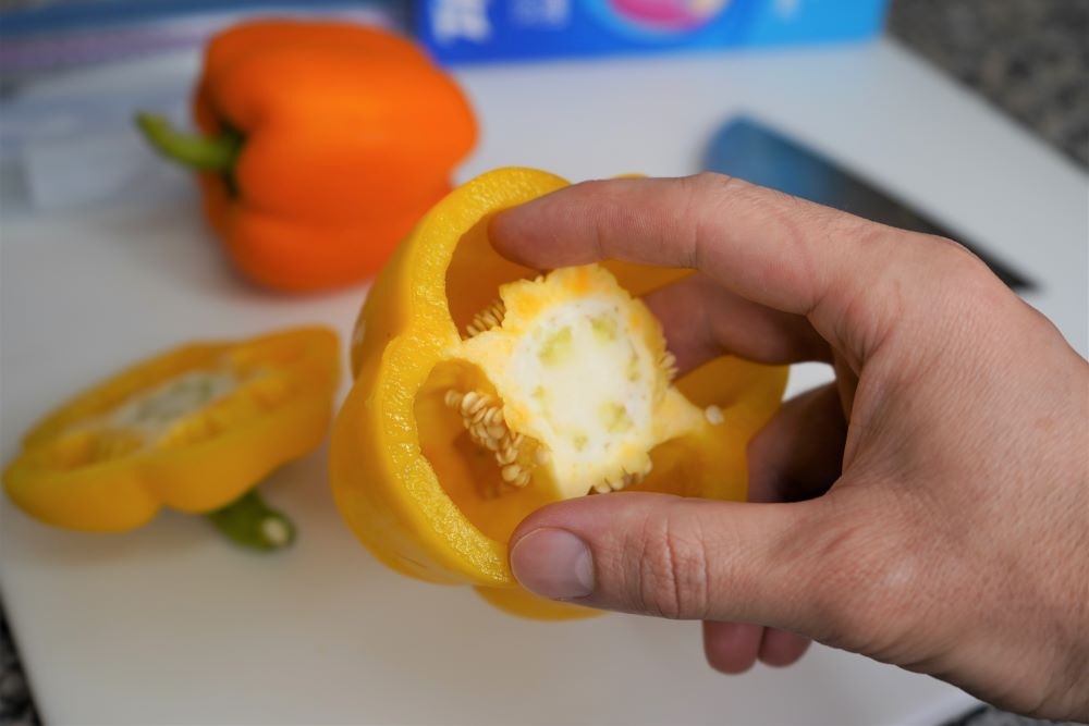 Removing seeds from bell pepper