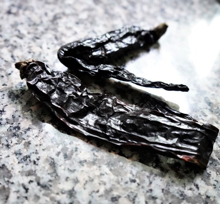 Two (2) dried pasilla peppers