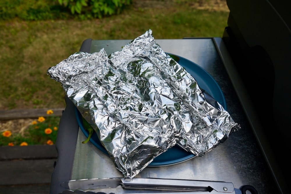 Aluminum foil smoker boxes with wood chips inside