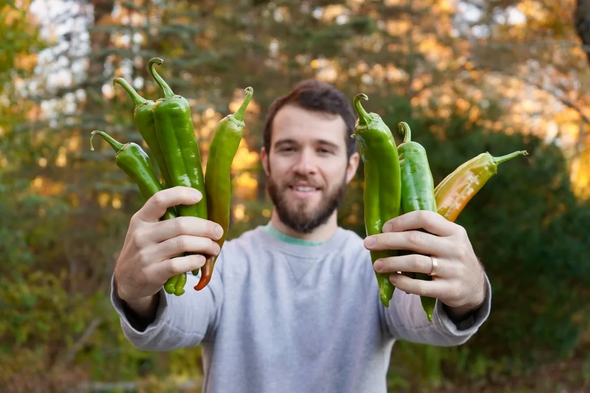 Calvin holding New Mexico hatch green chiles