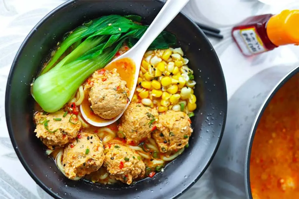 Spicy miso ramen with chicken meatballs