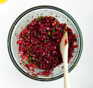 cranberry jalapeno relish with vinegar in bowl