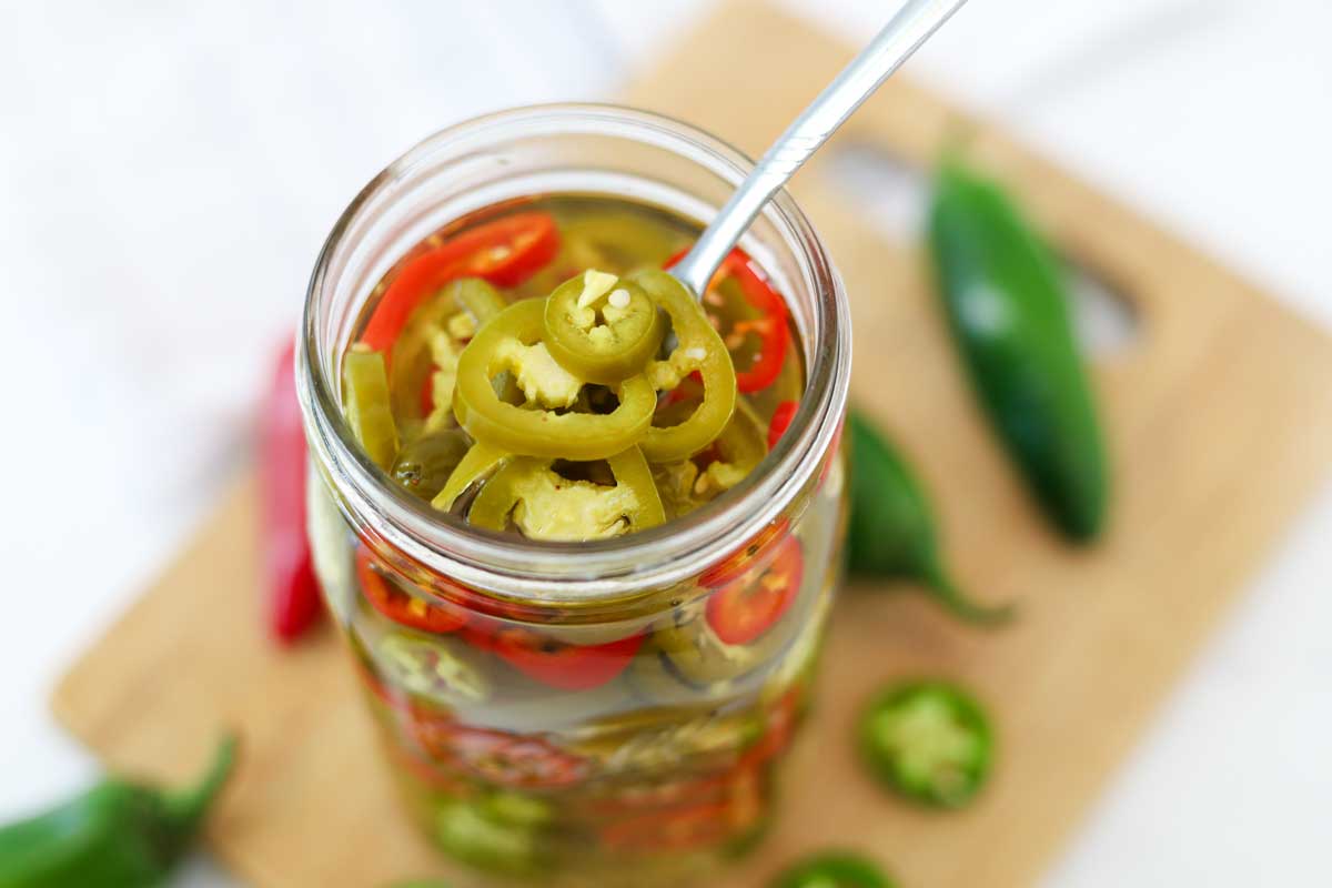 Pickled jalapeno peppers in ball jar