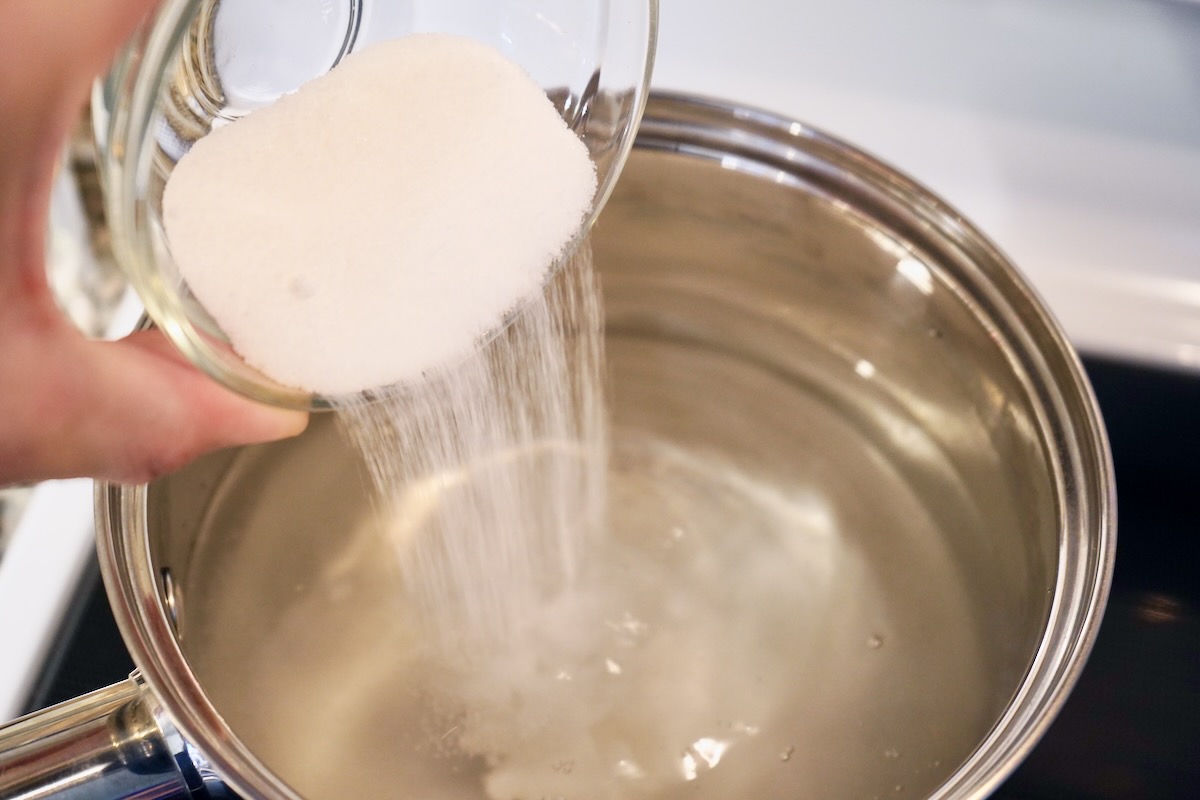 Adding salt and sugar to brine