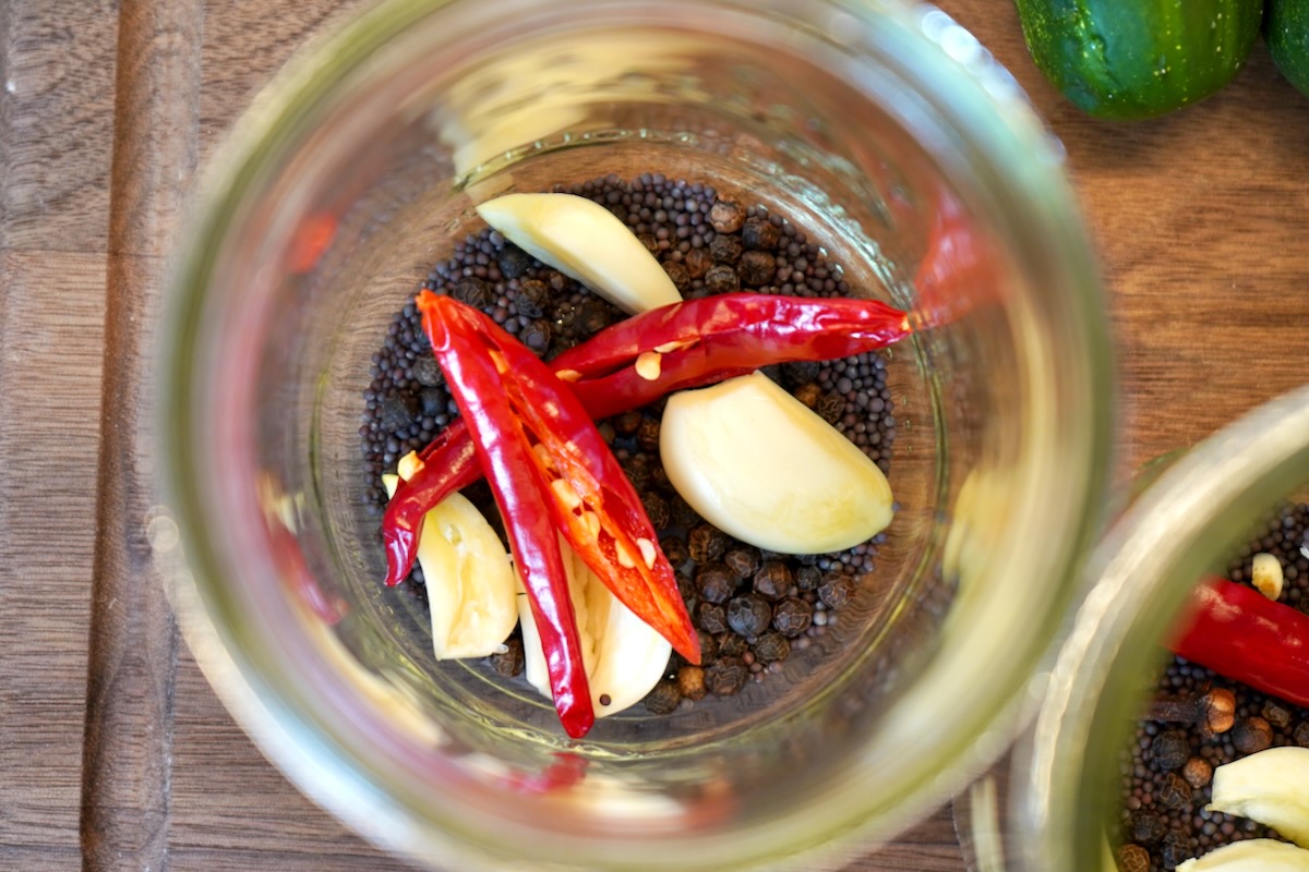Pickling spices in jar with garlic and hot chile