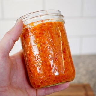 Fermented pepper mash in jar 2