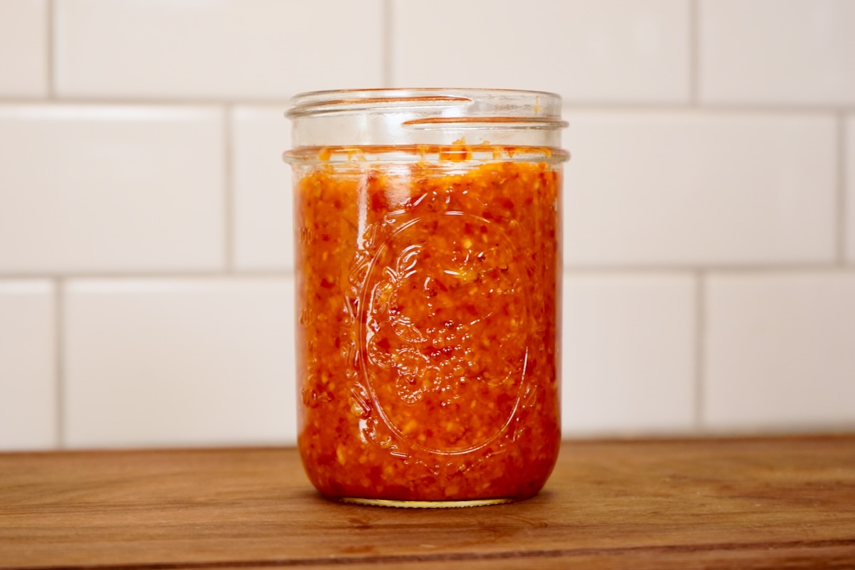 Fermented pepper mash in jar