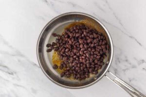 Beans in a pot with oil